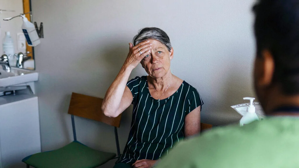 Senior woman with doctor