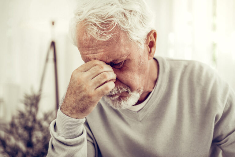 Feeling,Pain.,Old,Sick,Grey-haired,Man,In,Beige,Sweater,Feeling