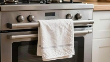 Kitchen safety: why hanging a towel on the oven risks fire and contamination Kitchen safety: why hanging a towel on the oven risks fire and contamination