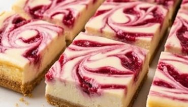 Raspberry Swirl Cheesecake Bars