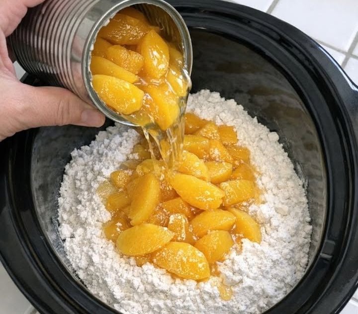 a-4-ingredient-slow-cooker-peach-cobbler-for-under cover
