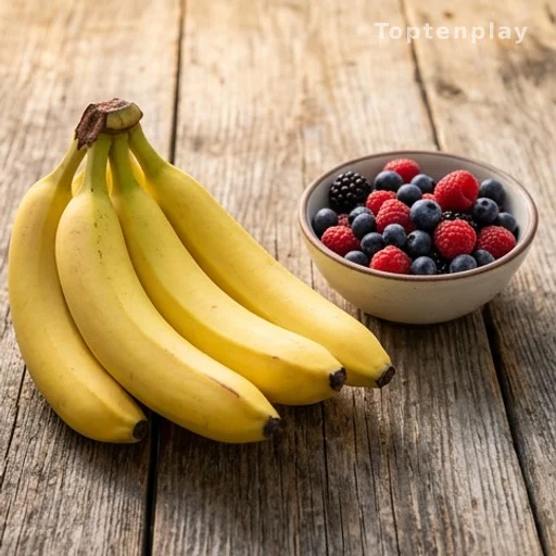 bananas and berries side by side illustrating everyday nutrition and superfood comparison
