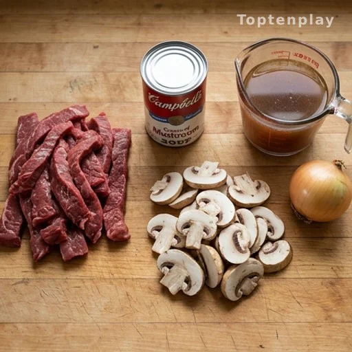 Budget family dinner ingredients for slow cooker beef stroganoff on a counter
