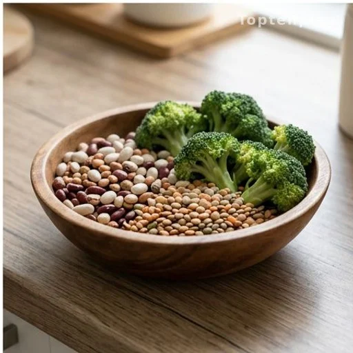 Bowl of beans lentils and broccoli common gas-producing foods