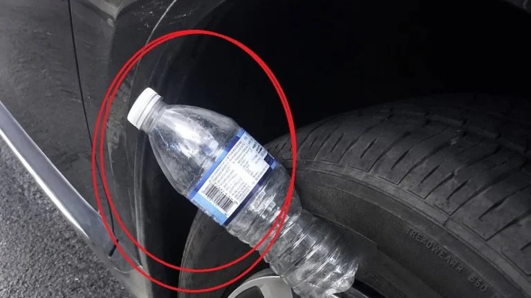 plastic-bottle-on-your-tire-the-carjacking-trick-y cover