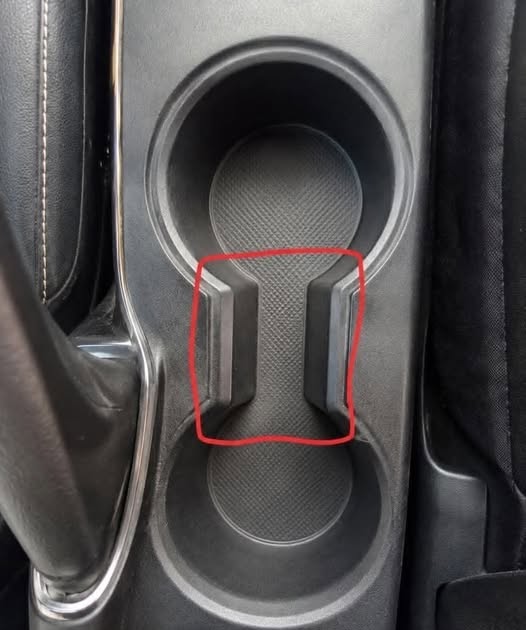 the-gap-in-your-car-s-cup-holders-actually-has-3-f cover