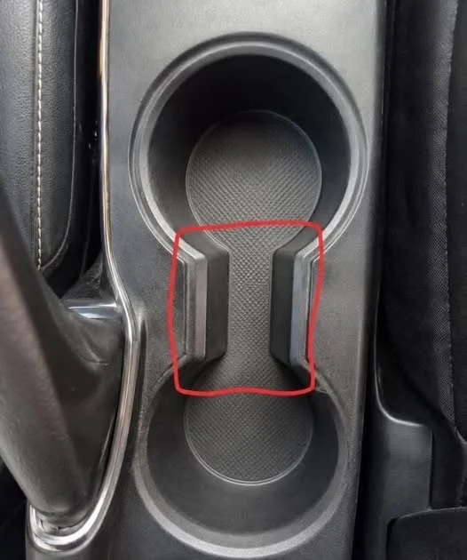 the-gap-in-your-car-s-cup-holders-actually-has-3-f cover