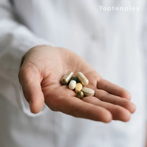 Selenium supplement capsules in a healthcare provider's hand, skin health treatment